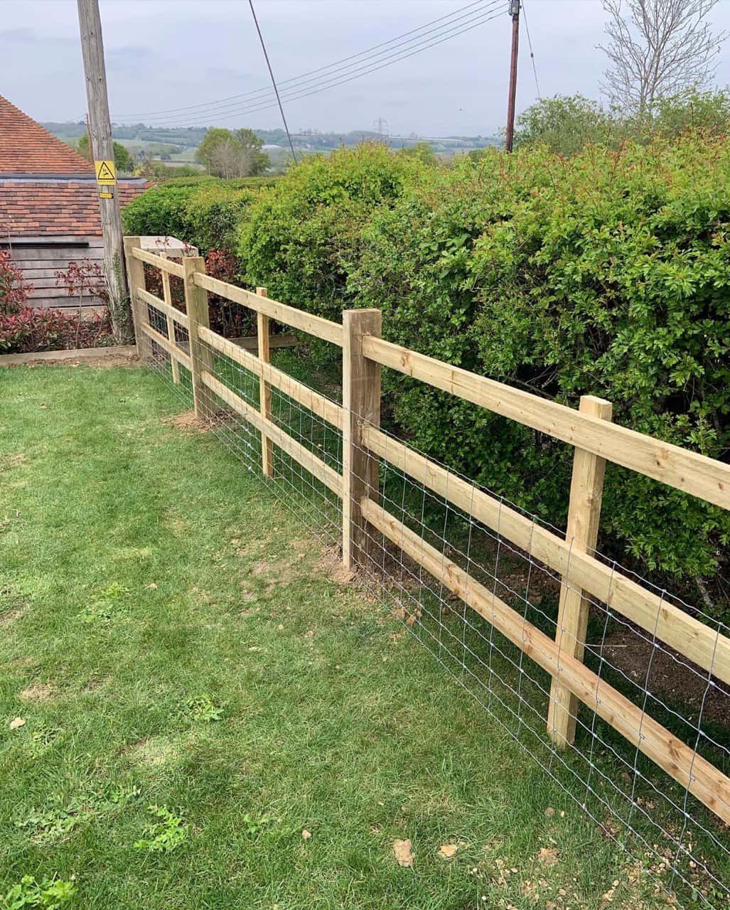 This is a photo of a picket fence and picket gate installed by Fast Fix Fencing Mildenhall